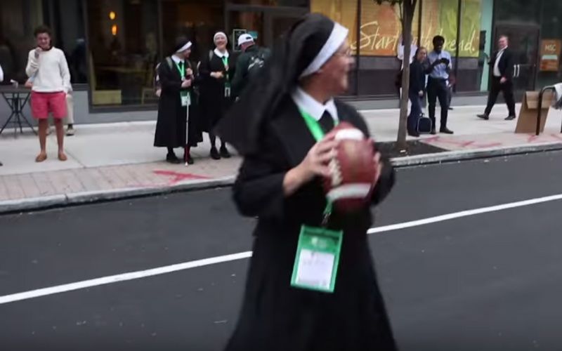 Watch This Awesome Nun Play Football On the Streets of Philadelphia