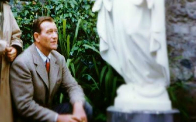 The Surprising (And Unsurprising) Photo of John Wayne & His Son Venerating the Blessed Mother