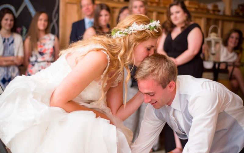 Husband Washes Wife's Feet at Wedding Reception Instead of Tossing Garter: "You Deserve to Be Cherished"