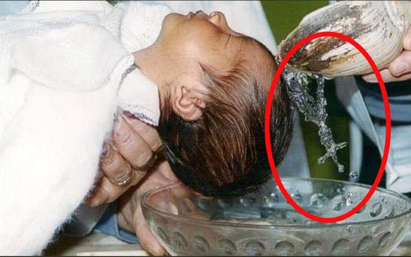 Miraculous: Rosary Allegedly Forms While Priest Pours Water During Baptism in Amazing Photo